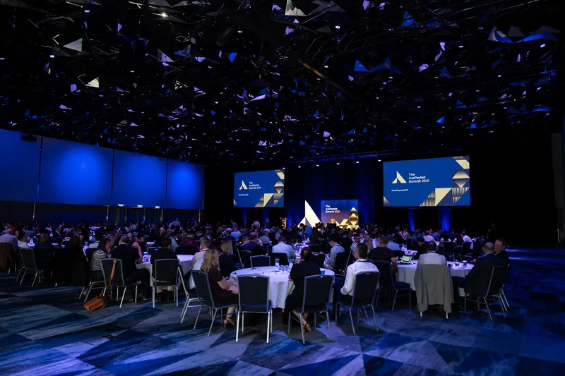 A wide shot of the full ballroom at the APN summit