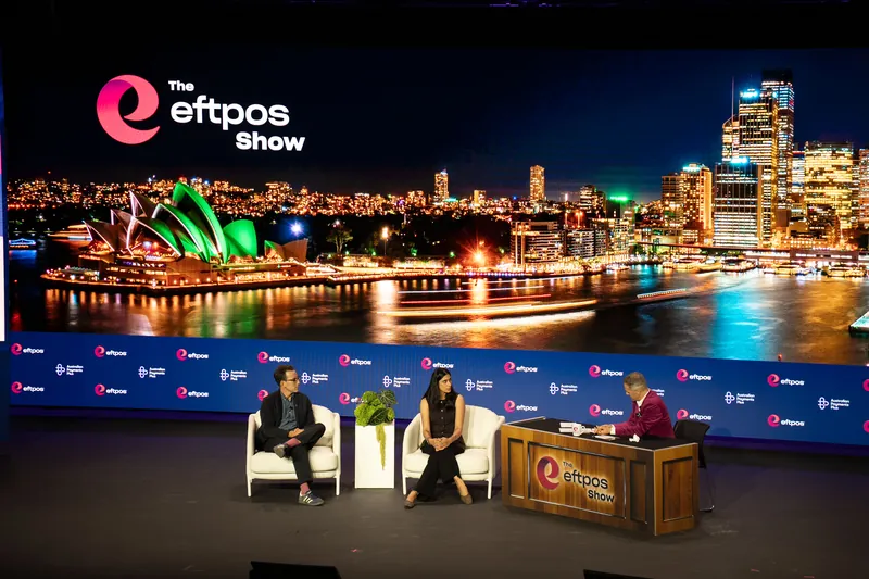 A panel on stage at an Australian Payments Plus event