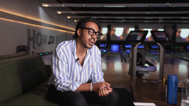 Ishaks team member interviewed at a bowling alley