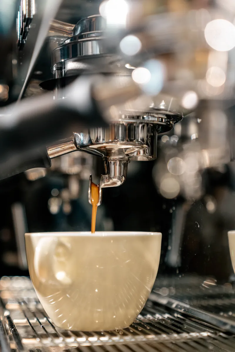 Coffee pouring at Olive Tree Cafe, from a food and coffee shoot