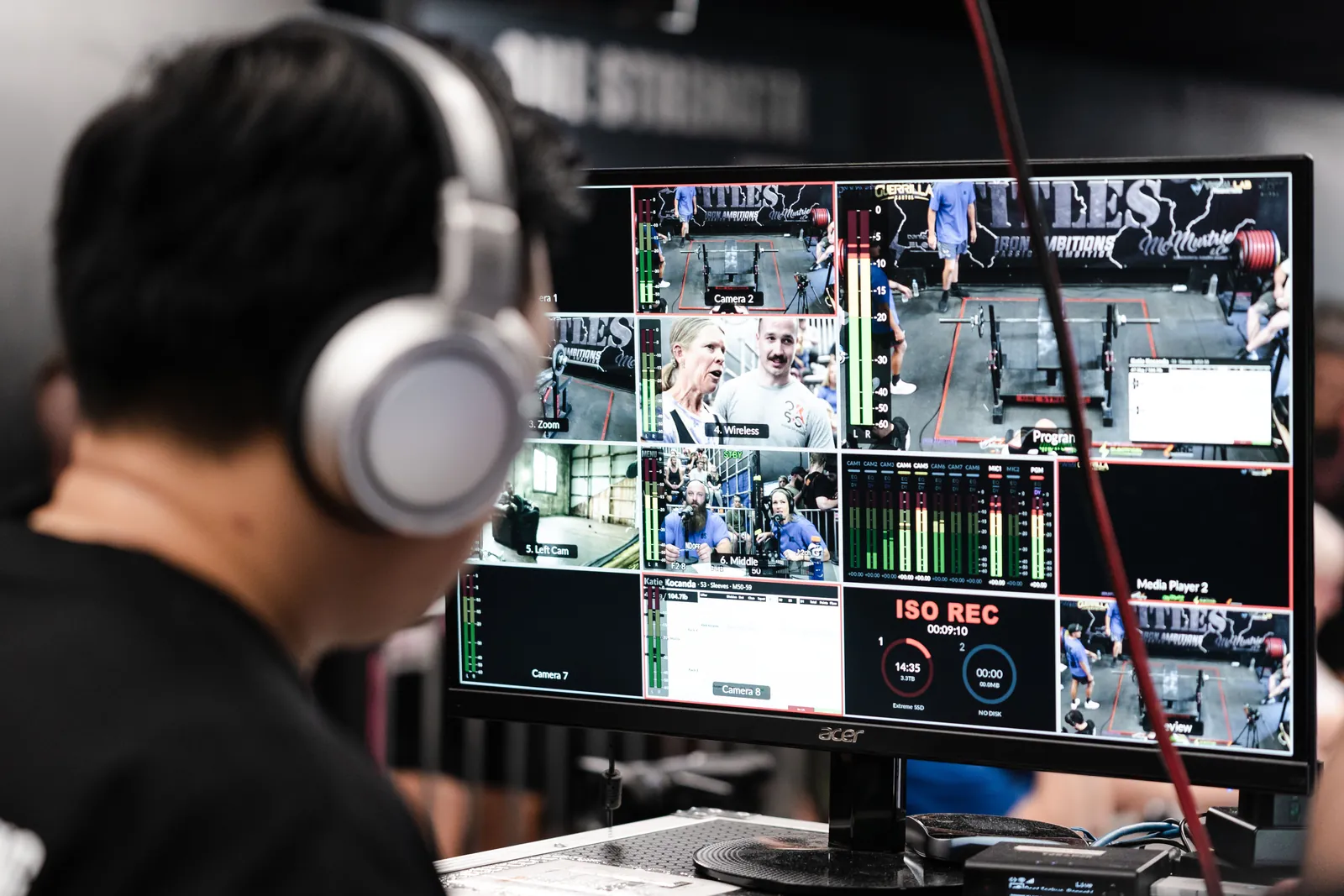 Operator running a One Strength livestream from the production desk