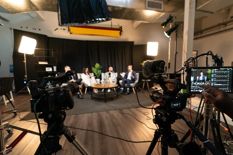Lights, cameras and monitors set up for the Ryker Capital podcast