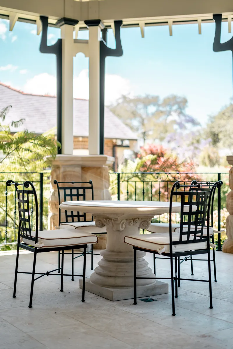 Outdoor dining setting on a covered terrace
